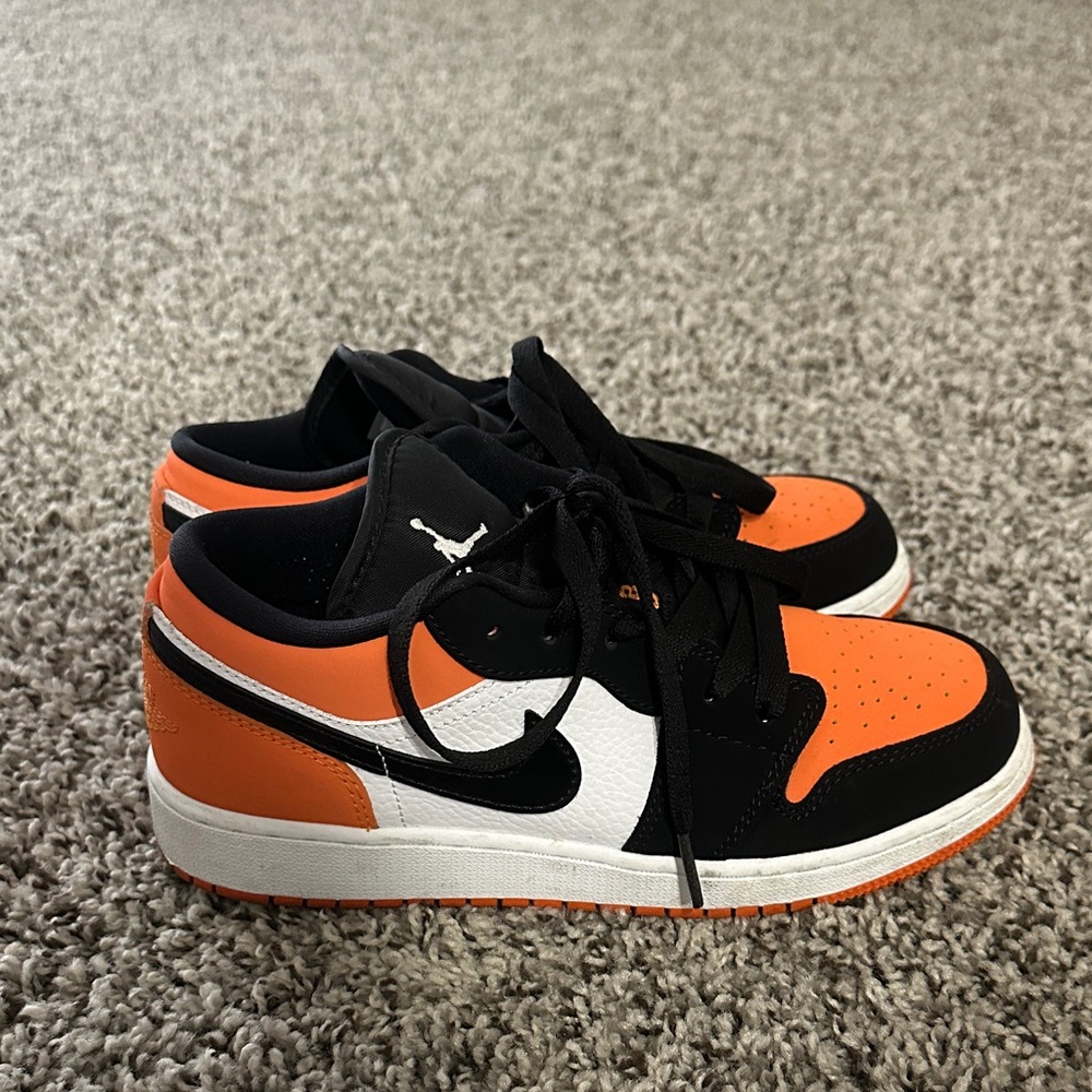 Jordan Black and Orange Sneakers